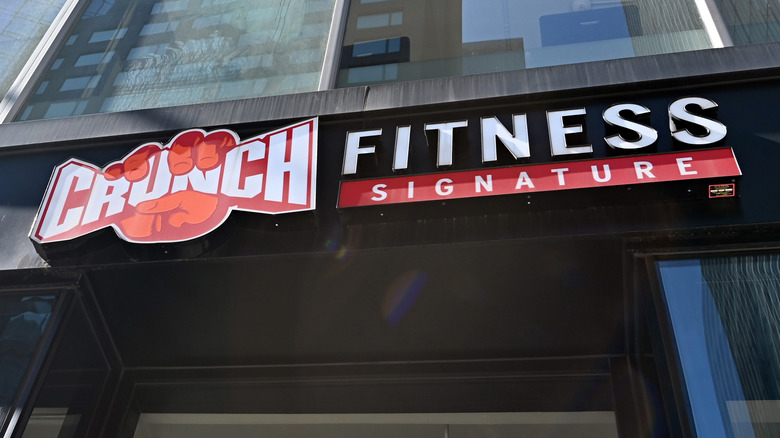 Crunch Fitness logo and storefront 