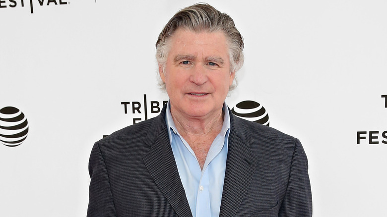 Treat Williams smiling on red carpet