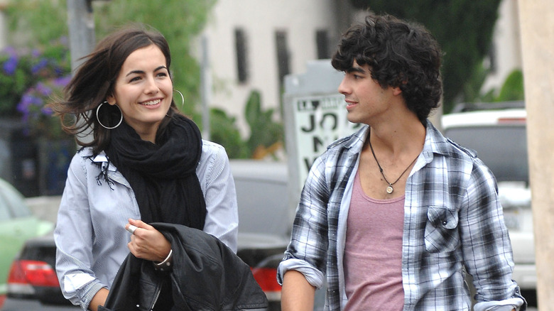 Camilla Belle and Joe Jonas walking