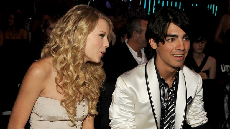 Taylor Swift and Joe Jonas sitting together