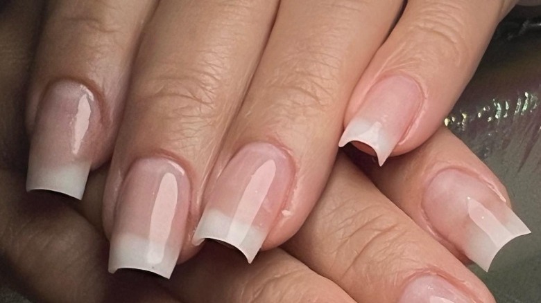 manicure with fiberglass nail wrap