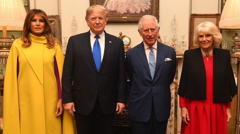 Melania Trump, Donald Trump, Prince Charles, and Camilla smiling