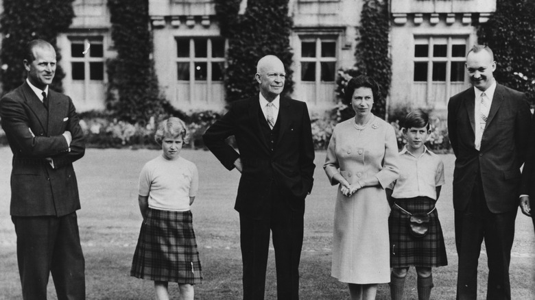 President Eisenhower standing with royal family