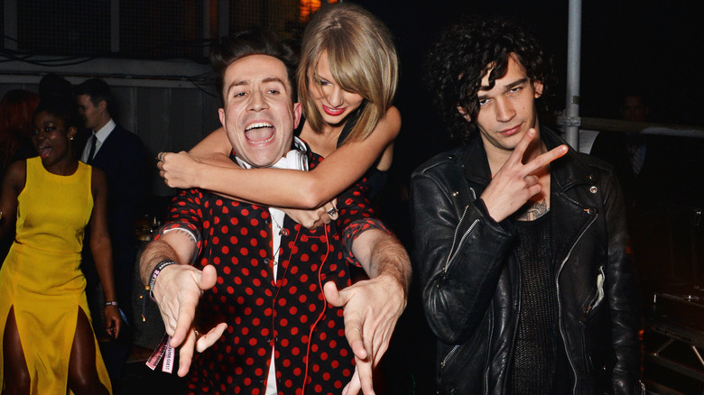 Taylor Swift and Matty Healy at party