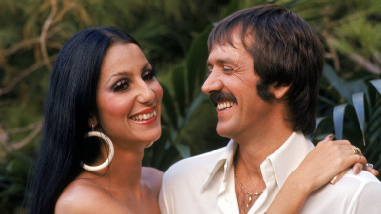 Cher and husband Sonny Bono smile for photos together in 1970.