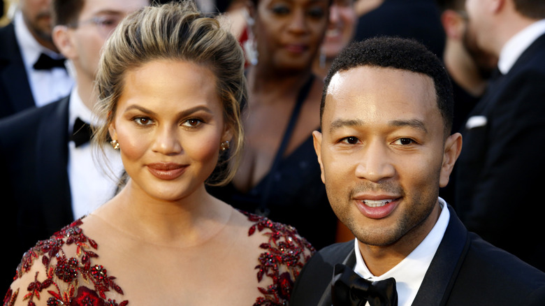 Chrissy Teigen and John Legend on red carpet