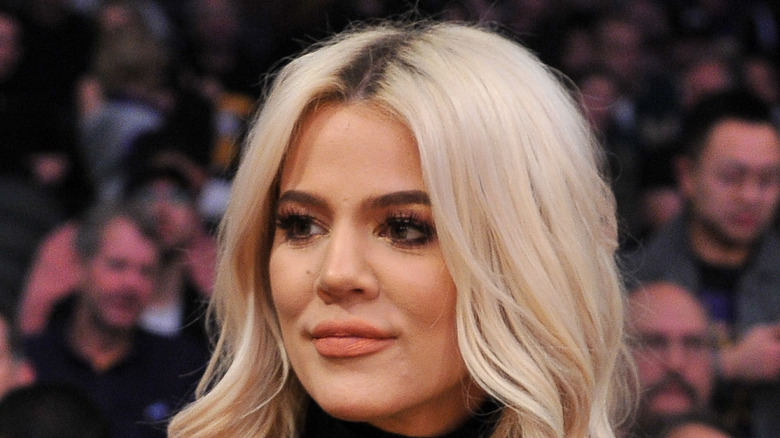 Khloe Kardashian attends an NBA game