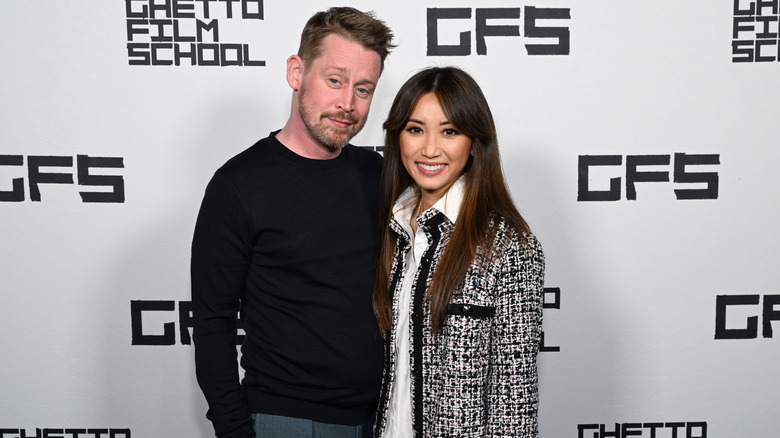 Macaulay Culkin and Brenda Song at a red carpet