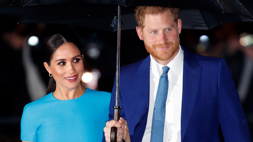 Meghan Markle and Prince Harry smile