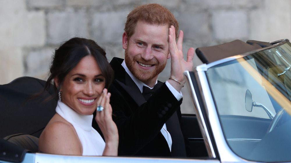 Meghan Markle and Prince Harry wave