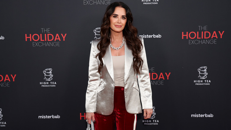 Kyle Richards attends "The Holiday Exchange" red carpet premiere in September 2024