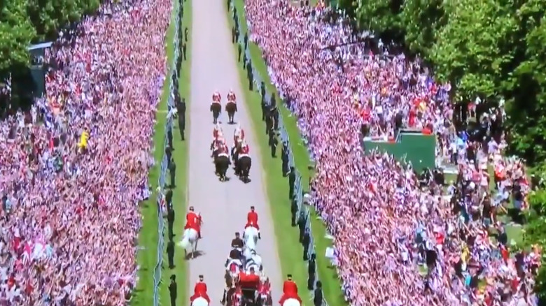 An aerial shot of the Queen's Guard cavalry procession