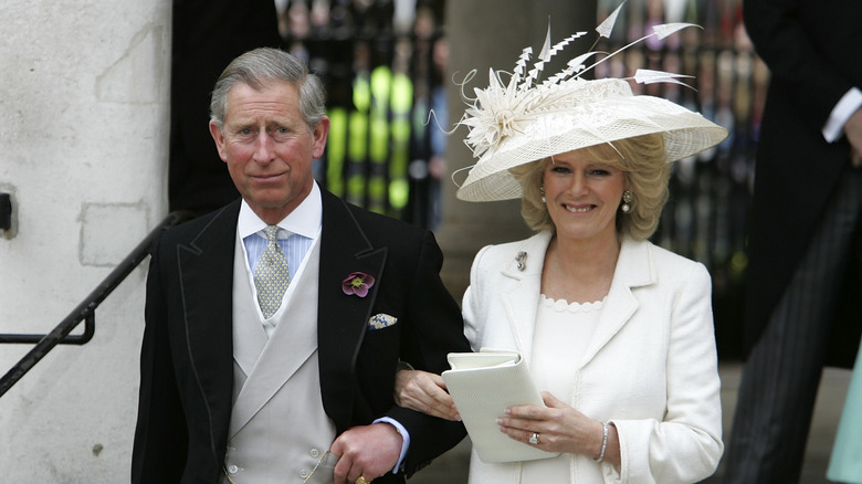 King Charles and Queen Camilla smiling