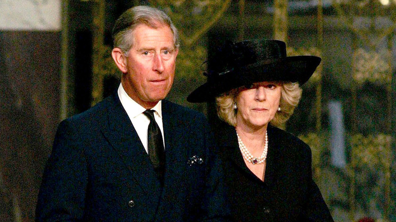 King Charles and Queen Camilla in funeral garb