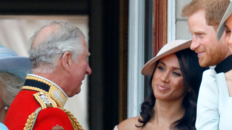 Charles with Harry and Meghan in 2018