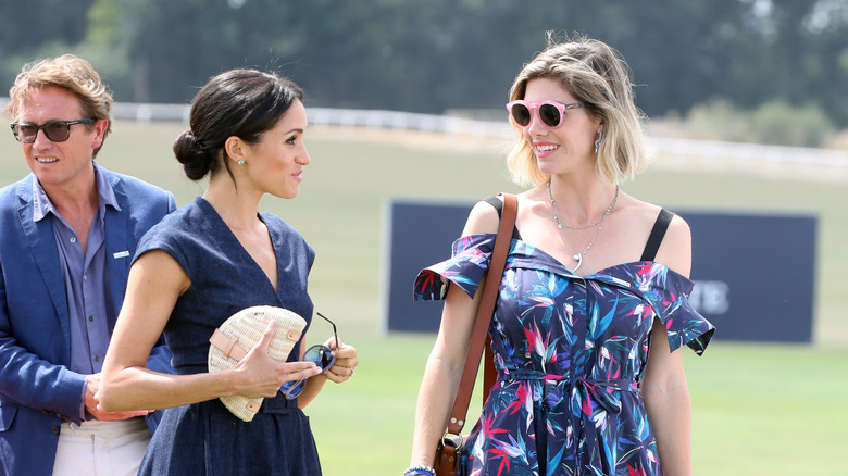 Delfina Blaquier and Meghan Markle chatting