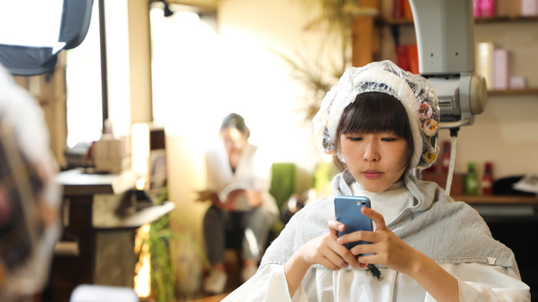 women getting perm treatment