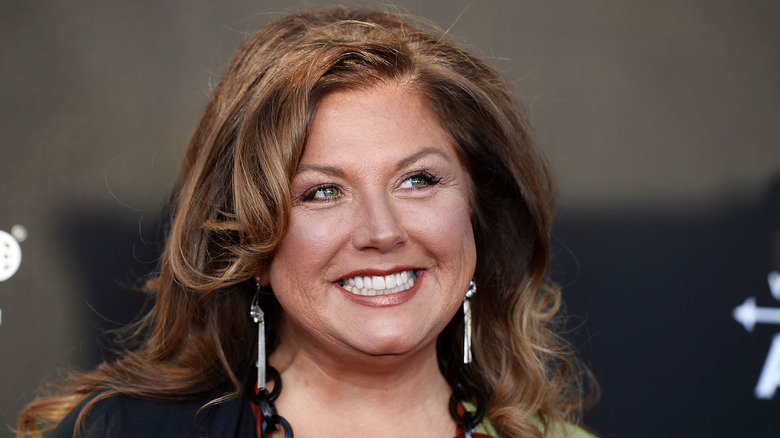 Abby Lee Miller smiling