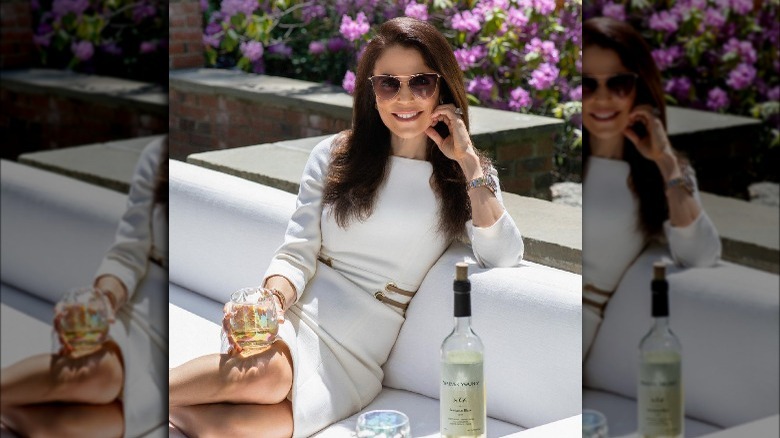 Bethenny Frankel poses with her Forever Young wine