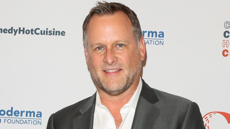 Dave Coulier smiling on the red carpet