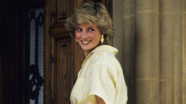 Diana Spencer smiling over her shoulder