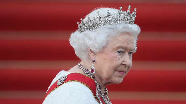 Queen Elizabeth wearing red and white