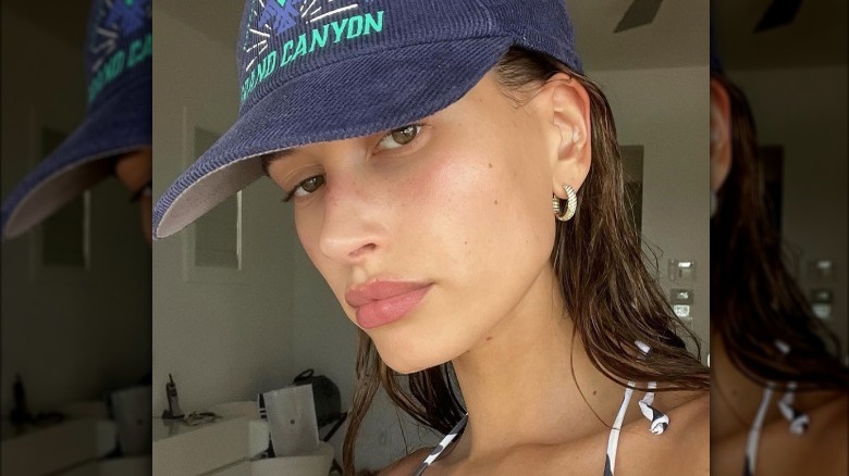 Hailey Bieber posing in fresh-faced selfie 