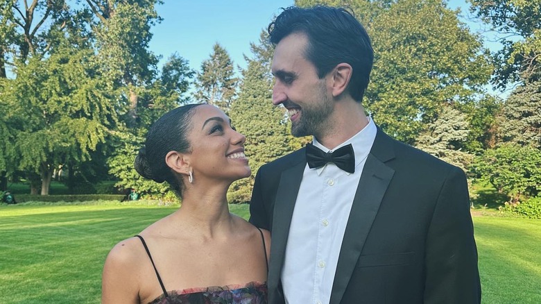 Corinne Foxx smiling with her husband Joe Hooten