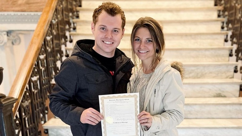 Jeremiah and Hannah with their marriage certificate