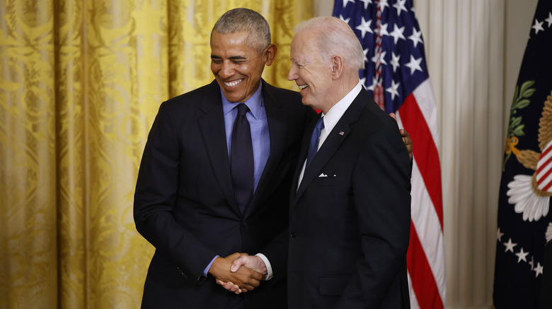 Obama and Biden shaking hands 