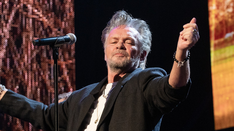 John Mellencamp performing onstage