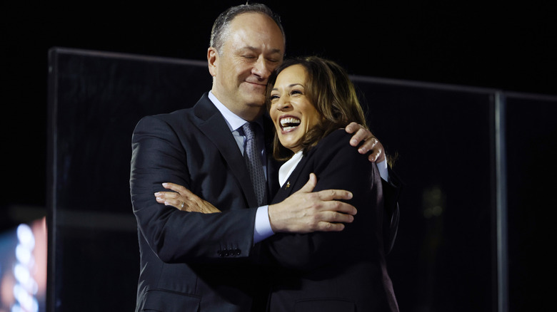 Kamala Harris and Doug Emhoff at a campaign rally in Washington, D.C., in October 2024