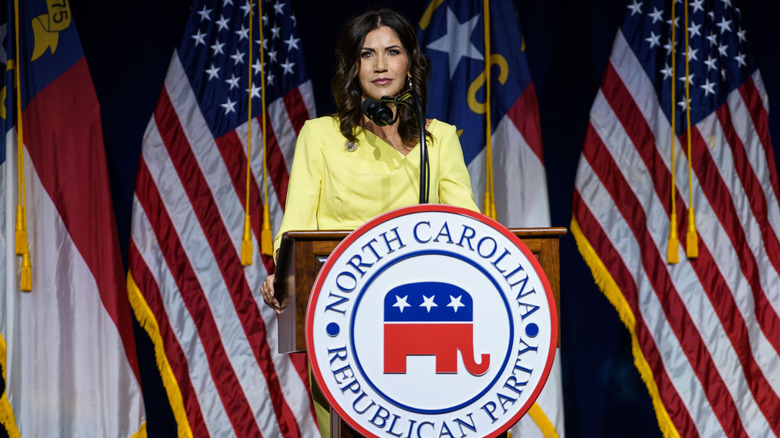 Kristi Noem speaking at podium