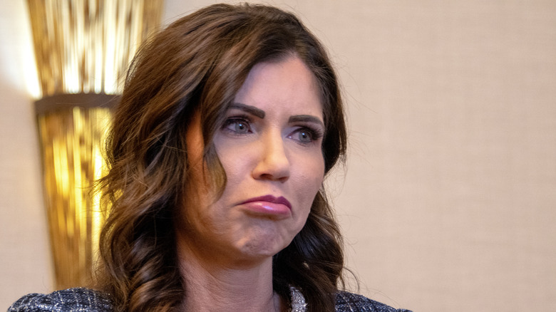 Kristi Noem frowning