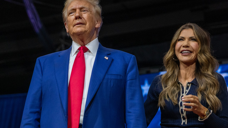 Donald Trump and Kristi Noem smiling