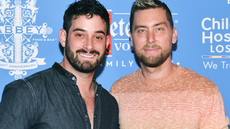 Michael Turchin and Lance Bass attending a charity event