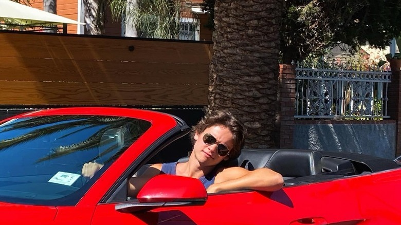 Jack Martin in a red car