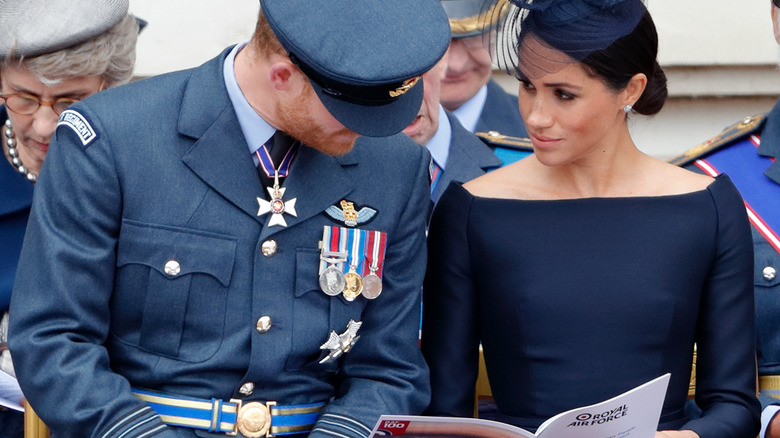 Meghan Markle and Prince Harry reading 