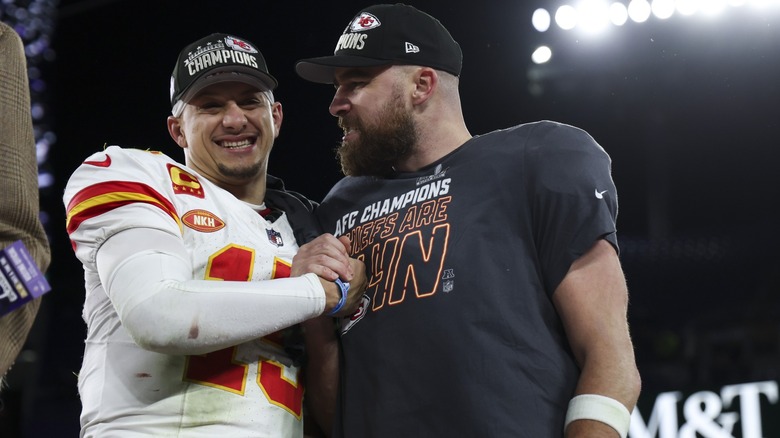 Patrick Mahomes and Travis Kelce embracing