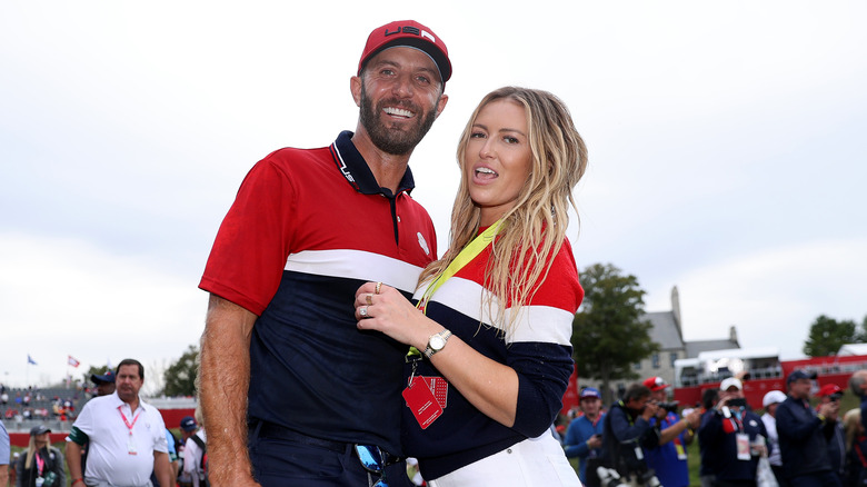 Dustin Johnson and Paulina Gretzky posing