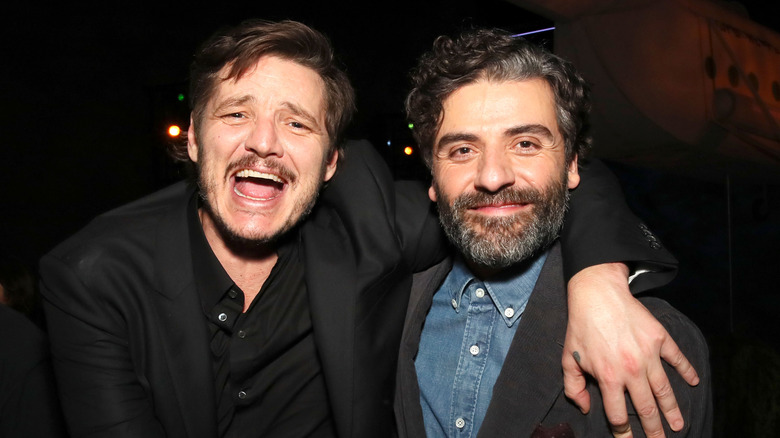 Pedro Pascal and Oscar Issac posing