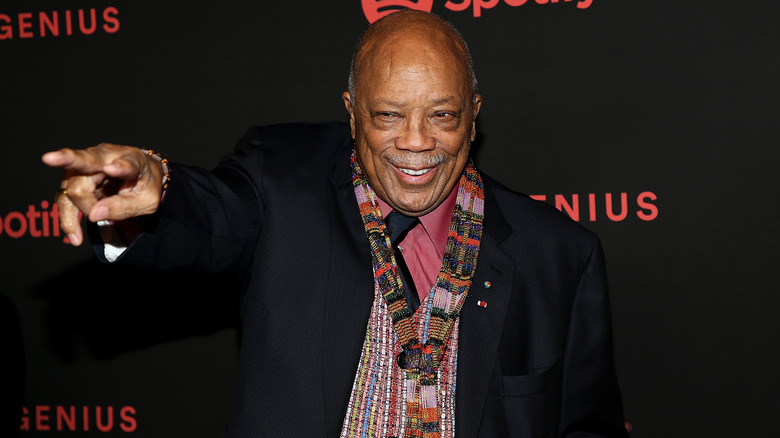 Quincy Jones posing for photos