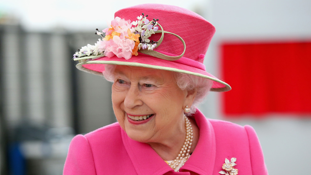 Queen Elizabeth in a bright pink outfit