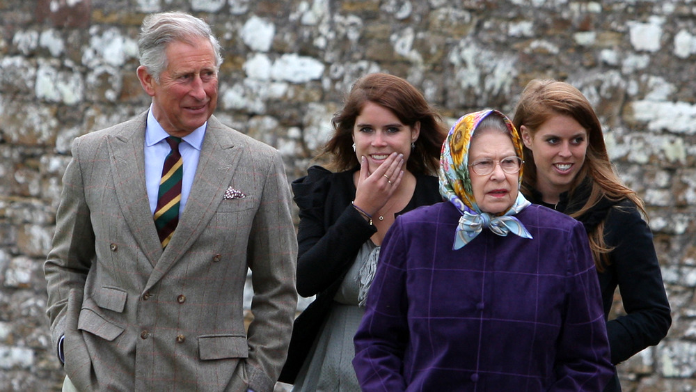 Queen Elizabeth, Prince Charles, and Princesses Beatrice and Eugenie