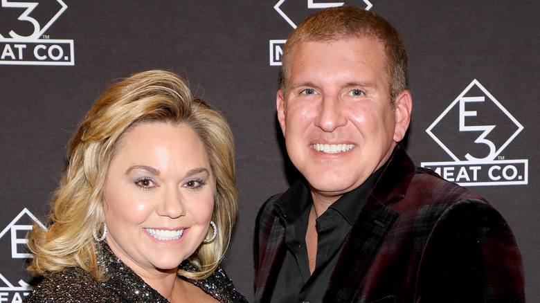 Julie Chrisley and Todd Chrisley at the opening of E3 Chophouse