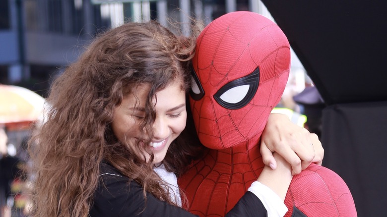 MJ holding onto Spider-Man