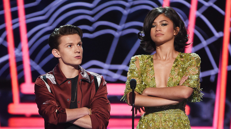 Tom Holland and Zendaya arms crossed