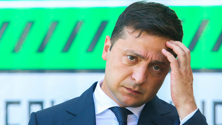 Volodymyr Zelenskyy scratching his head 