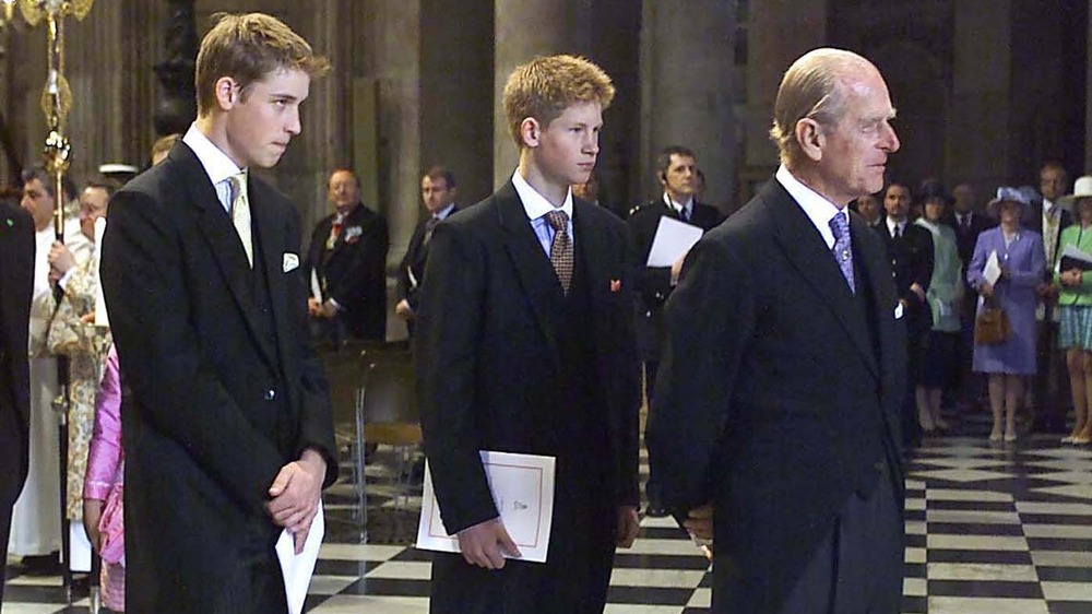 Young Prince William, Young Prince Harry, and Prince Philip
