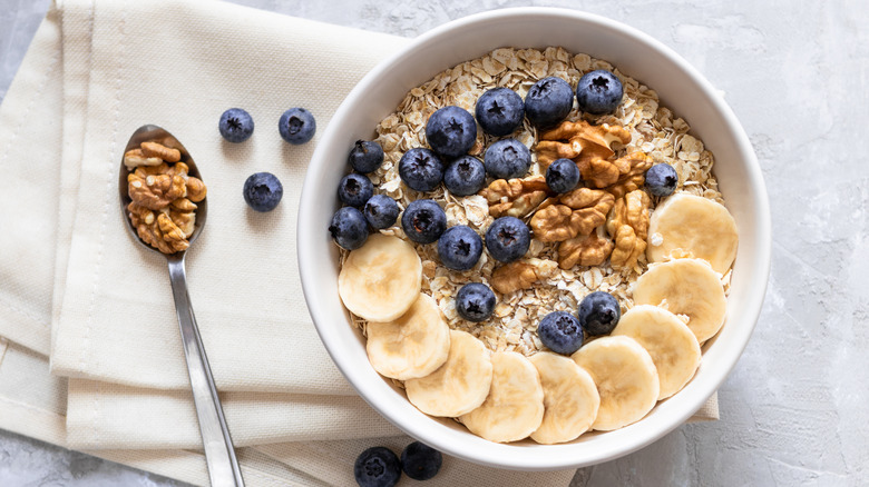 Bowl of oatmeal with fruit and nuts